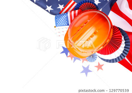 Colorful Labor Day decorations alongside a hard hat, isolated, PNG 129770539