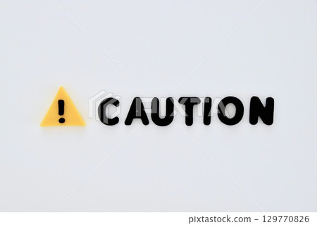 Warning mark and caution word 129770826