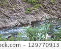 The clear stream of Kiyotsu Gorge, huge rock walls, and cliffs with columnar joints 129770913