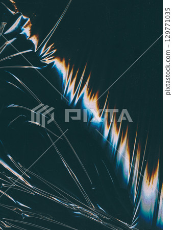 Crumpled foil. Glitch glow flare. Fiction color light wave scratch defocused black background copy space. Distressed gradient distortion surface. Crumpled foil. Glitch glow flare. Fiction color light wave scratch defocused black background copy space. Distressed gradient distortion surface. 129771035