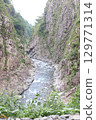 The clear stream of Kiyotsu Gorge, huge rock walls, and cliffs with columnar joints 129771314