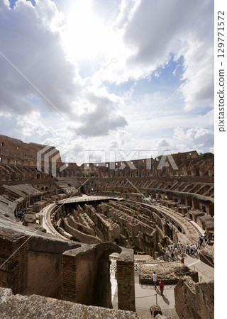 View of the interior of the Roman Colosseum, a World Heritage Site, and the ancient ruins View of the interior of the Roman Colosseum, a World Heritage Site, and the ancient ruins 129771572