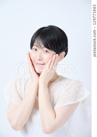 Beauty of a middle-aged woman with short hair Beauty of a middle-aged woman with short hair 129771683