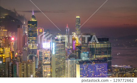 Aug 8 2025 Central Hong Kong skyline glowing at twilight 129772662