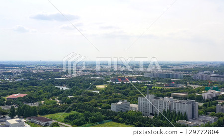 Aerial view of modern city and blue sky Aerial view of modern city and blue sky 129772804
