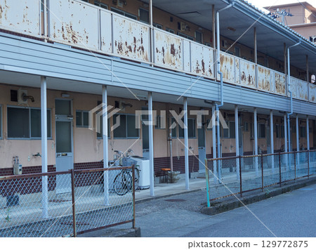 Abandoned apartments for employees of a bankrupt hotel in a Japanese tourist destination 129772875