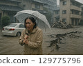A woman evacuates during heavy rain 129775796