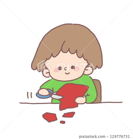 圖:一個孩子熟練地用剪刀剪紅色建築紙,享受手工製作的樂趣 圖:一個孩子熟練地用剪刀剪紅色建築紙,享受手工製作的樂趣 129776731