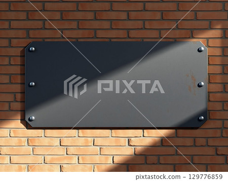 Blank Metal Sign on Textured Brick Wall 129776859