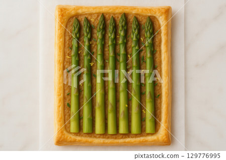 Square Puff Pastry Tart With Asparagus Spears And Herbs 129776995