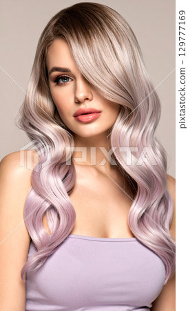 beautiful blonde woman with long hair 129777169