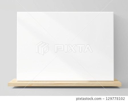 Blank White Canvas on Wooden Shelf, Minimalist Art Display 129778102