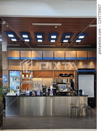 this is food and drink display at cafe  129778907