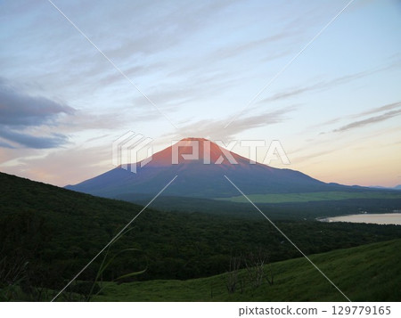 Fuji in the morning glow and the mountain lake 129779165