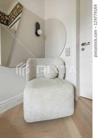 Modern Beige Armchair in Minimalist Corner Interior 129779169