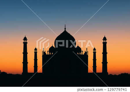 Taj Mahal silhouette at sunset 129779741