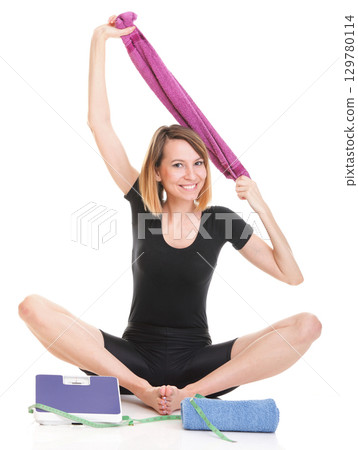 Caucasian young woman weight scale isolated white Caucasian young woman weight scale isolated white 129780114