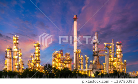 Oil and gas refinery plant at night, Global business energy logistic transportation, Oil and gas refinery petrochemical industrial, Petrochemical refinery industrial energy supply chain. 129780398