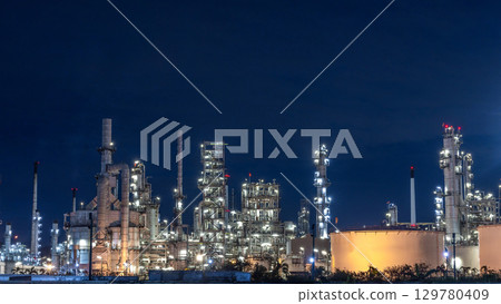 Oil and gas refinery plant at night, Global business energy logistic transportation, Oil and gas refinery petrochemical industrial, Petrochemical refinery industrial energy supply chain. 129780409