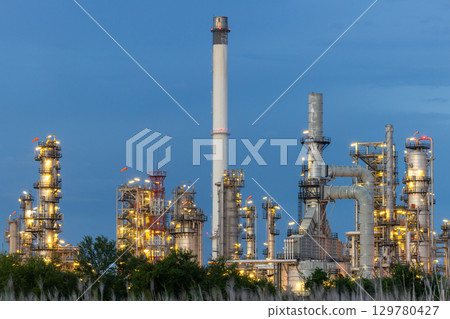 Oil and gas refinery plant at night, Global business energy logistic transportation, Oil and gas refinery petrochemical industrial, Petrochemical refinery industrial energy supply chain. 129780427