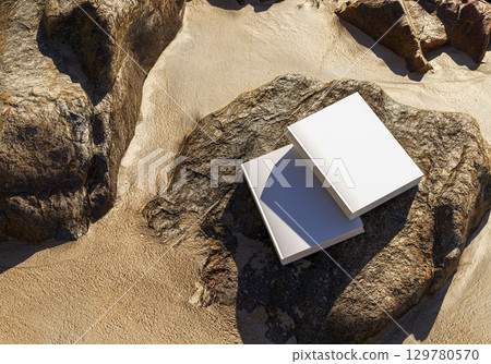 Book mockup on stone with golden sand background outdoor scene for design branding education storytelling creativity and natural concept Book mockup on stone with golden sand background outdoor scene for design branding education storytelling creativity and natural concept 129780570