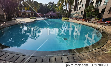 swimming pool with stair at hotel 129780611