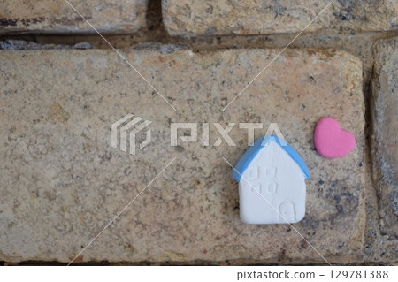 Paper clay house and bricks 129781388