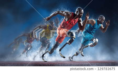Dynamic image of diverse male Paralympic athletes sprinting with prosthetic legs 129781675