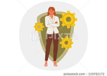 Woman cyber security engineer recommends antivirus for data protection, stands near large shield 129782172