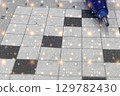 Sparkling Crossword Puzzle. A magical close-up of a crossword grid with a pencil. Perfect for themes of creativity, intelligence, and puzzles. 129782430