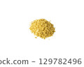 Savoury vegan yeast flakes heap isolated on white background. 129782496