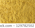 Savoury vegan yeast flakes background. 129782502
