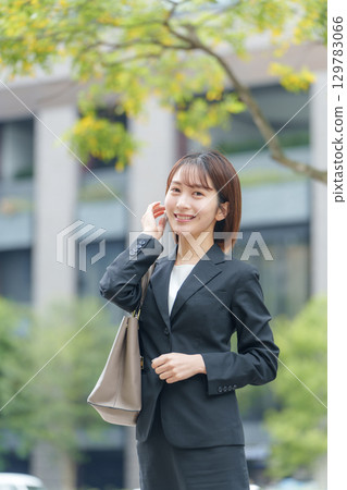 Young woman business outdoor portrait Young woman business outdoor portrait 129783066