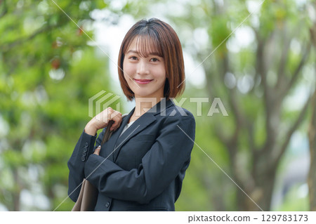 Young woman business outdoors Young woman business outdoors 129783173