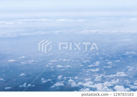 Sky and clouds background from above on Earth Sky and clouds background from above on Earth 129783183