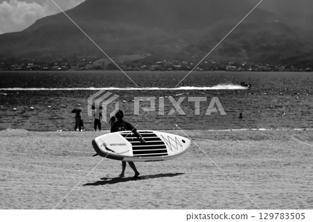 Coast and Surfer Coast and Surfer 129783505