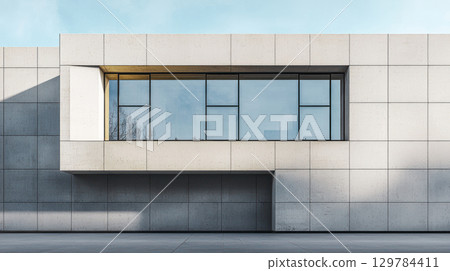 modern Bauhaus inspired building facade with clean lines, geometric shapes, and large glass windows under clear sky 129784411