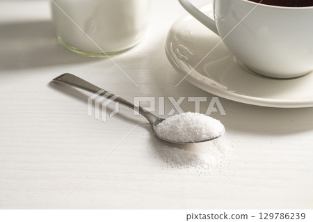 Spoon of sweetener. Sugar alternative, food and nutrition Spoon of sweetener. Sugar alternative, food and nutrition 129786239