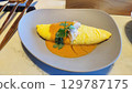 Fluffy omelette with crab and sauce - a dish from a fine dining restaurant 129787175