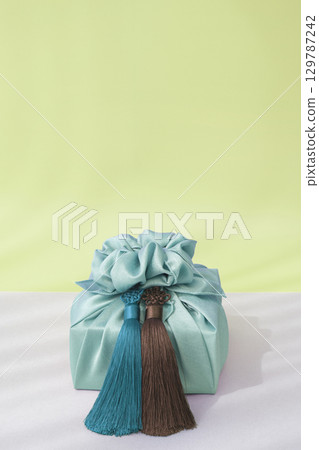 Korean holiday gift wrapping with bojagi (wrapping cloth), Chuseok and Hangawi gifts and copyspace 129787242