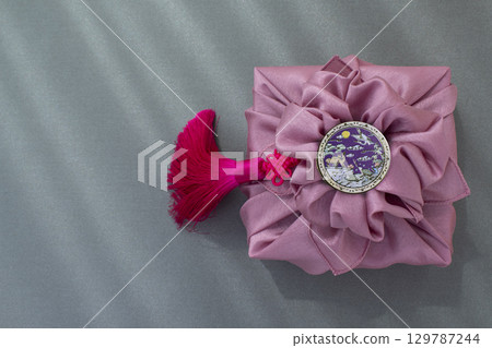 Korean holiday gift wrapping with bojagi (wrapping cloth), Chuseok and Hangawi gifts and copyspace 129787244