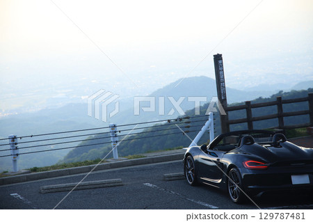 Glossy black open car Glossy black open car 129787481