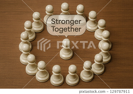 Pawn chess representing leadership with encouraging message that is stronger together Pawn chess representing leadership with encouraging message that is stronger together 129787911