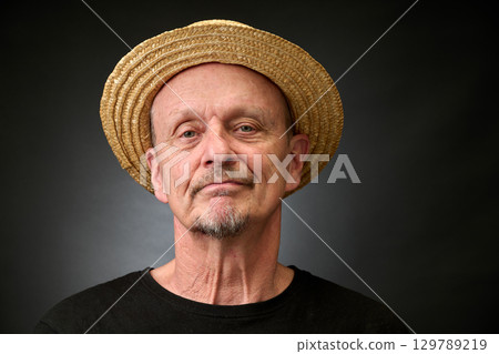 Portrait of a senior man in a vintage Harcourt style lighting Portrait of a senior man in a vintage Harcourt style lighting 129789219