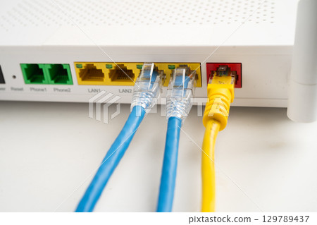 Ethernet cable with wireless router connect to internet service provider network. Ethernet cable with wireless router connect to internet service provider network. 129789437