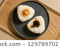 Rice balls on a plate 129789702