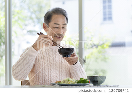 Senior men who eat Senior men who eat 129789741