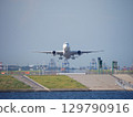 A pure white aircraft taking off from Haneda Airport 129790916
