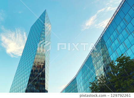 Office building. Glass skyscrapers in business center. Architecture, commercial real estate Office building. Glass skyscrapers in business center. Architecture, commercial real estate 129792261