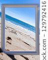 The summer sea peeking through a white picture frame 129792416